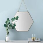 miroir dore hexagonal